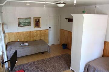Фото номера Трехместный номер с общей ванной комнатой Хостелы Kartano Hostel г. Кокемяки 2